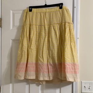 Yellow and beige skirt.